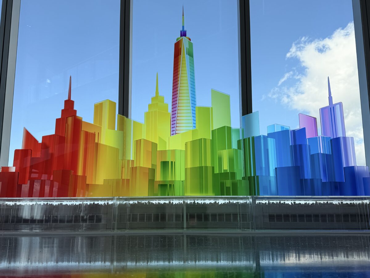 Laser-cut acrylic NYC skyline sculpture installed at One World Observatory for Pride Month